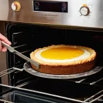 Home 13 제과제빵 실습 중 흔한 실수와 대처법 - **Prompt 1: The Baker's Precision - Temperature Control**
"A close-up shot of a professional-loo...